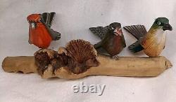 3 Hand Carved Canaries Perched On A Carved Wooden Log With 3 Nests Hand Painted