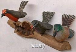 3 Hand Carved Canaries Perched On A Carved Wooden Log With 3 Nests Hand Painted