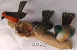 3 Hand Carved Canaries Perched On A Carved Wooden Log With 3 Nests Hand Painted