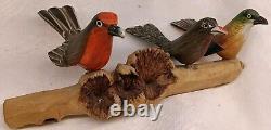 3 Hand Carved Canaries Perched On A Carved Wooden Log With 3 Nests Hand Painted