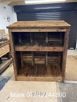 Rustic Wooden log store with kindling shelf