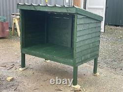 Wooden Log Store or Roadside stand