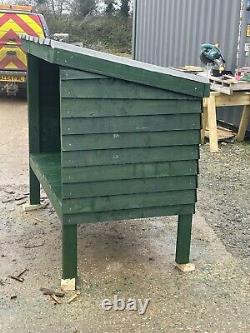 Wooden Log Store or Roadside stand