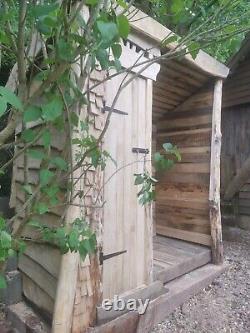 Wooden log shed
