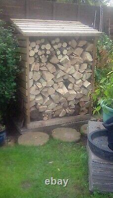 Wooden log store shed New